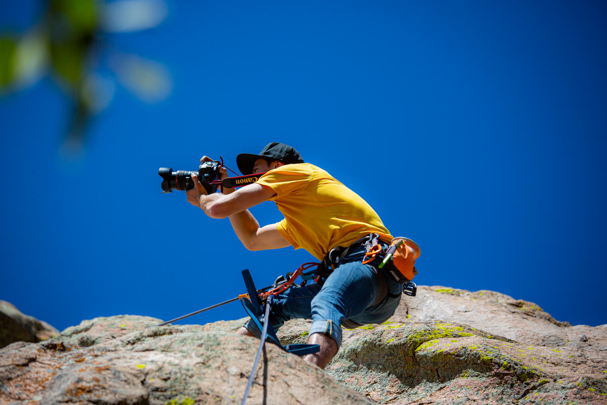 Grayson Geiger shooting from a cliffside